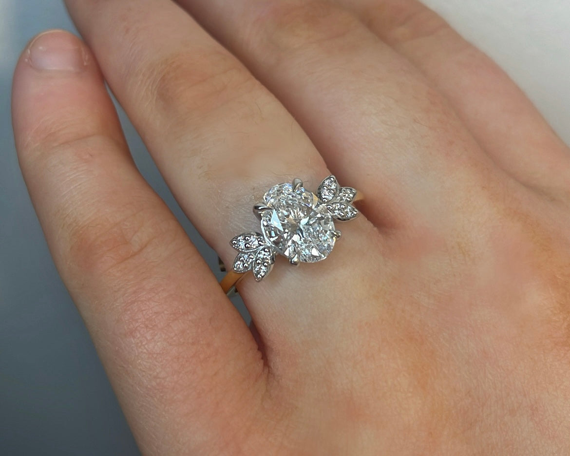 1ct Oval Diamond & Petal Side Stones in 18ct Yellow Gold