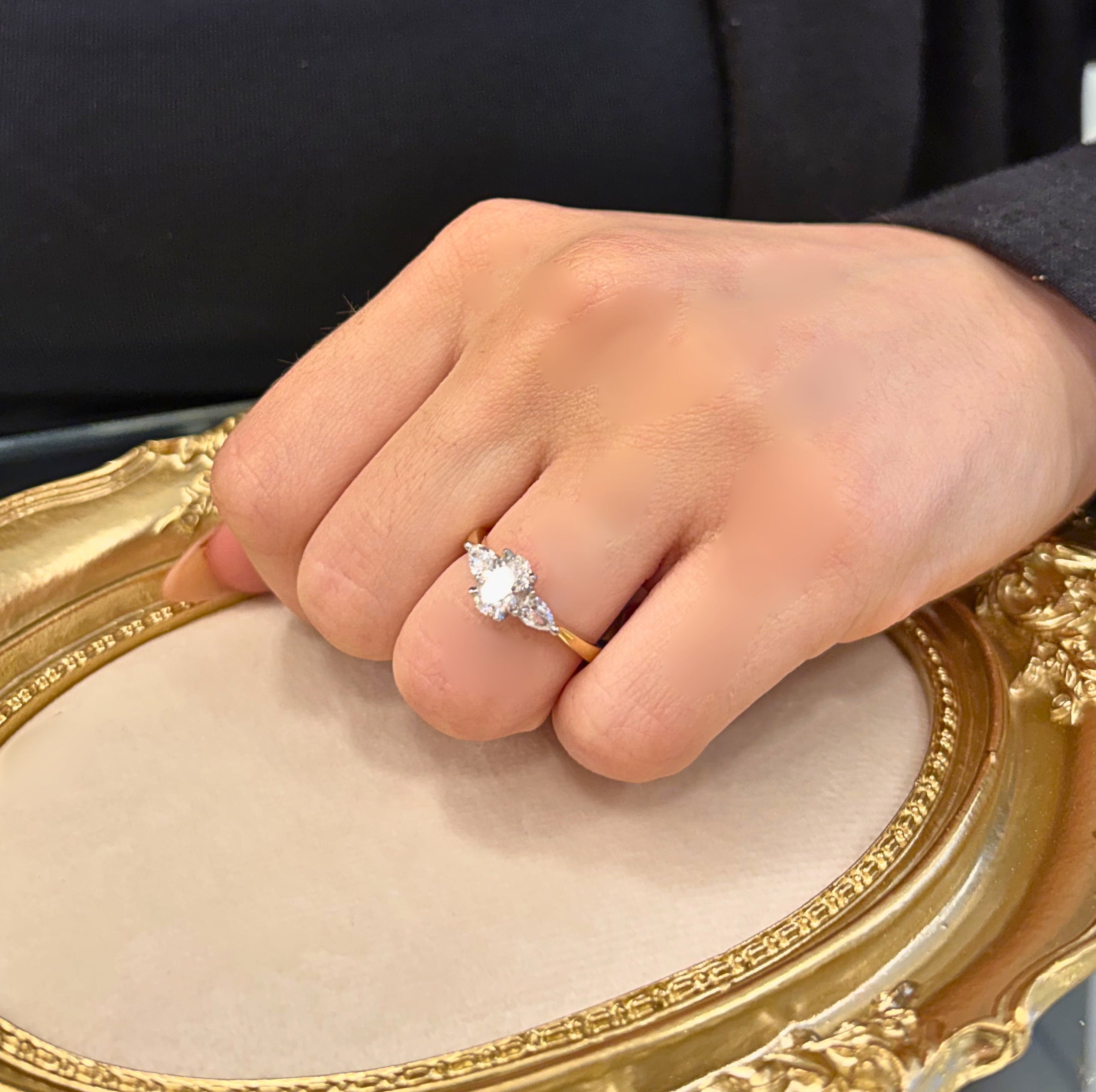 0.72ct Oval with pear cut side stones in 18ct yellow gold
