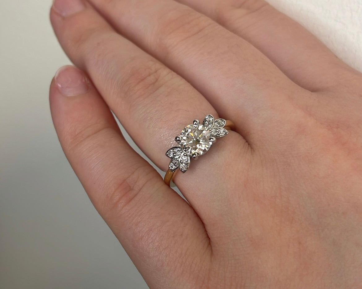1ct Round Brilliant Diamond & Petal Side Stones in 18ct Yellow Gold