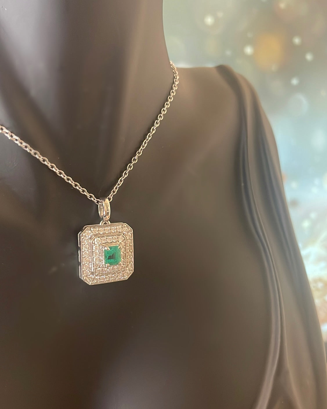9ct White Gold Emerald & Diamond double Halo Pendant