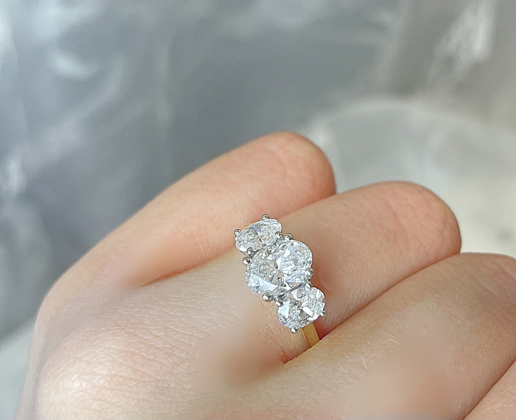 1.54ct Oval trilogy ring in 18ct yellow gold