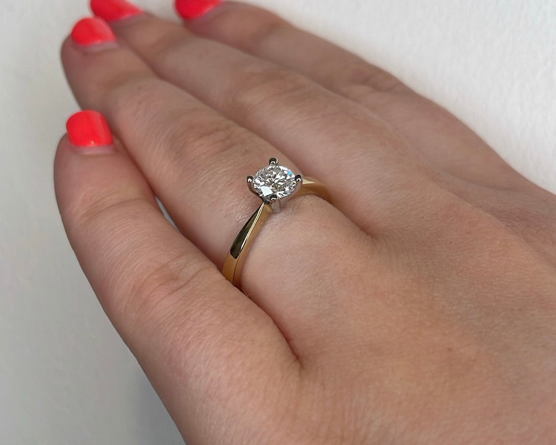 0.56ct Round Brilliant Solitaire Ring in 9ct Yellow Gold with Platinum Setting