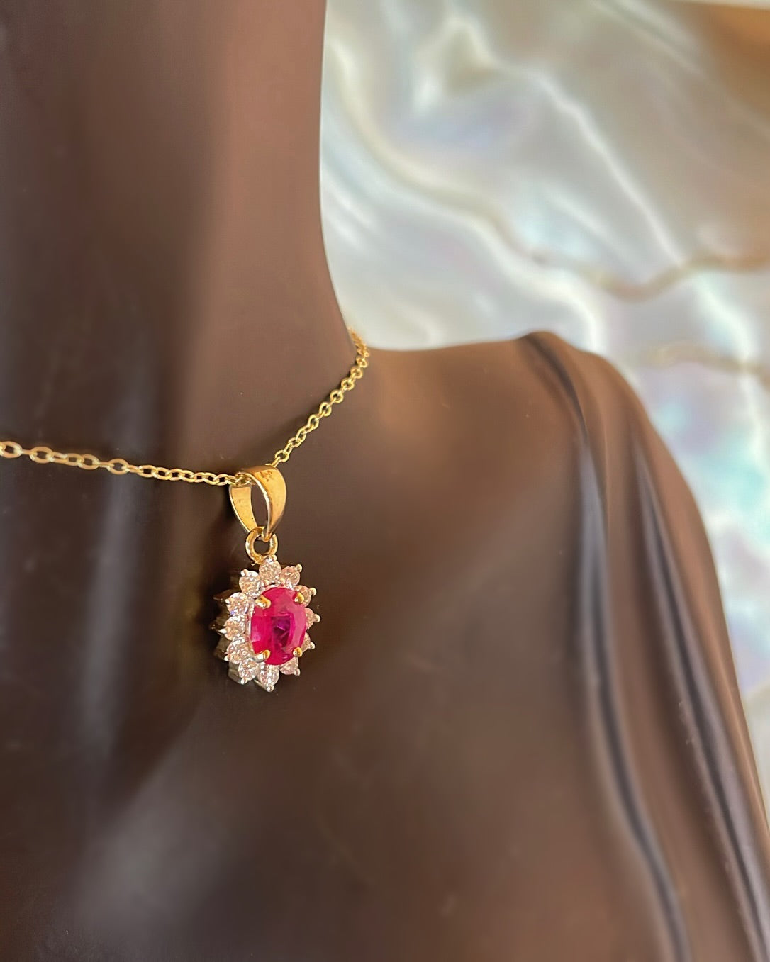 Oval Cut Ruby & Floral Diamond Halo 9ct Gold Pendant