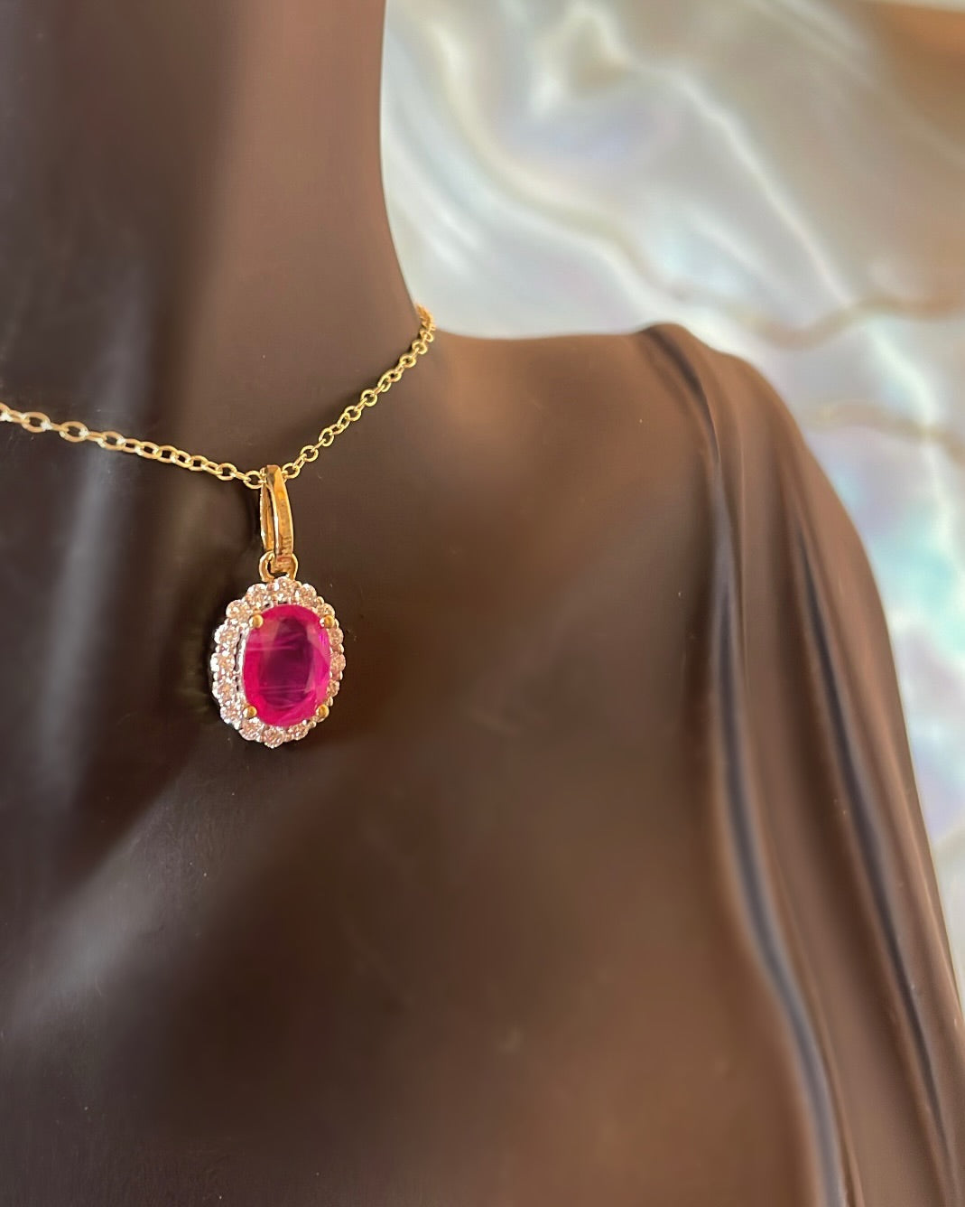 Oval Cut Ruby & Halo Diamond 9ct Yellow Gold Pendant