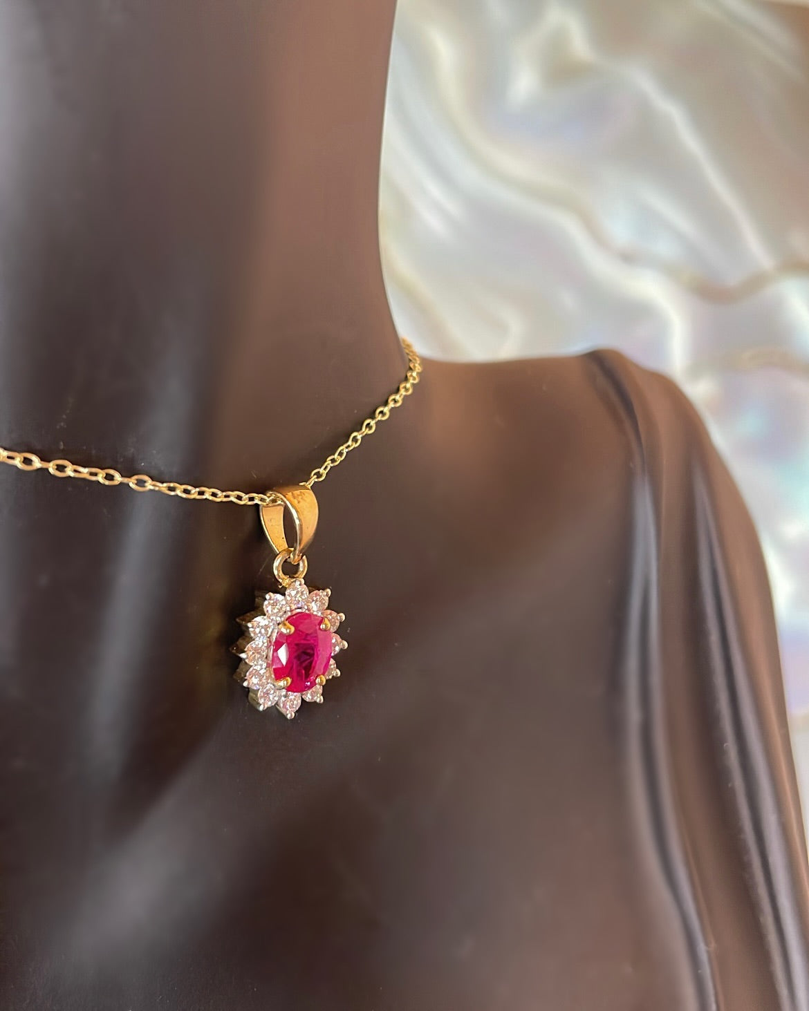 Oval Cut Ruby & Floral Diamond Halo 9ct Gold Pendant