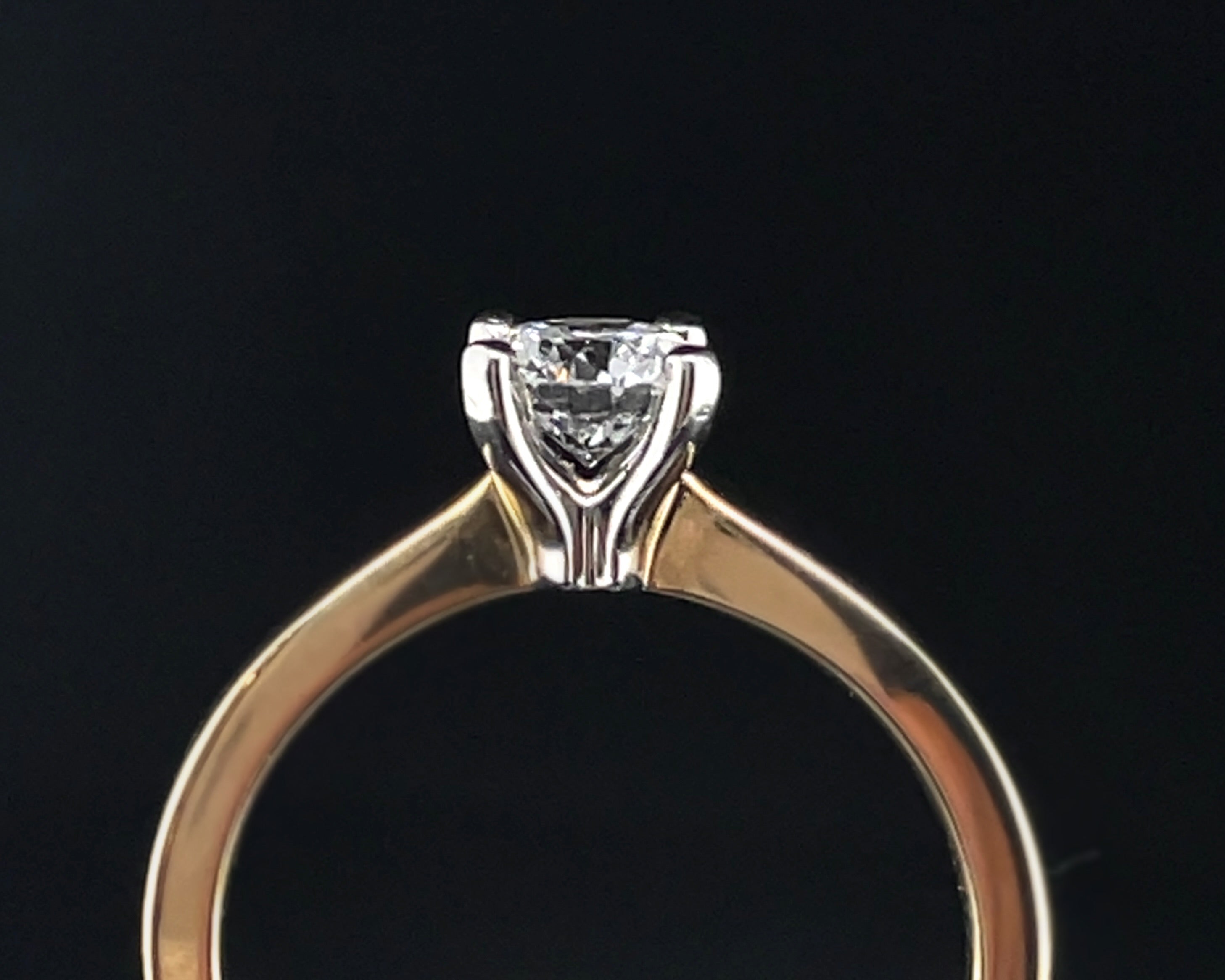 0.56ct Round Brilliant Solitaire Ring in 9ct Yellow Gold with Platinum Setting