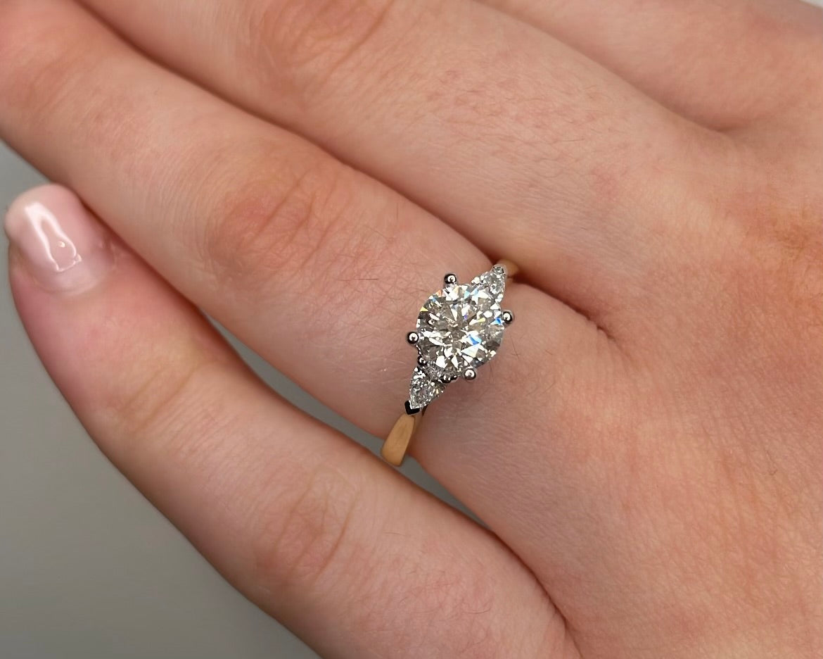 0.90ct Diamond Trilogy Ring with Pear Cut Side Stones in 18ct Yellow Gold