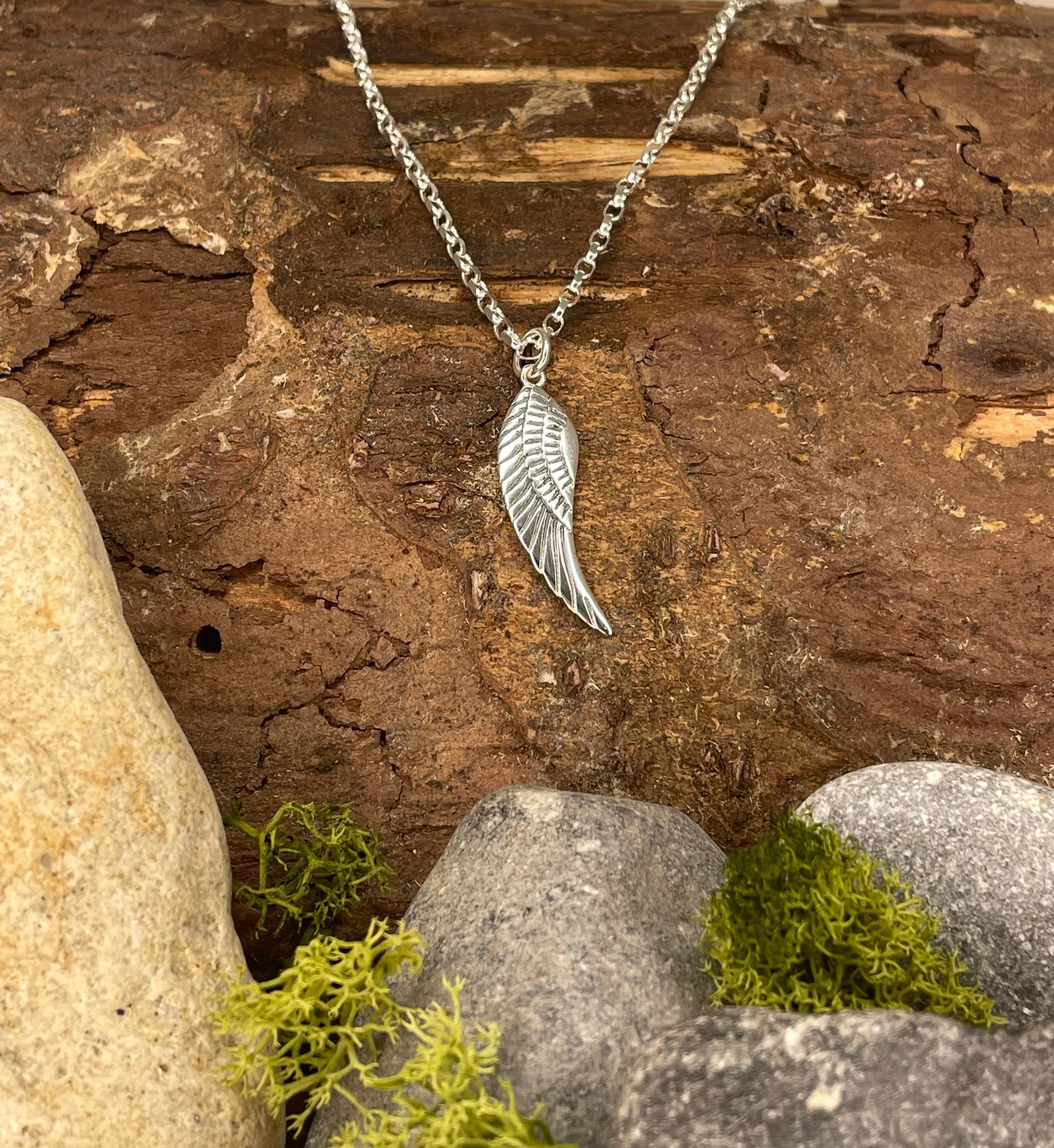 Angel wing store pendant silver