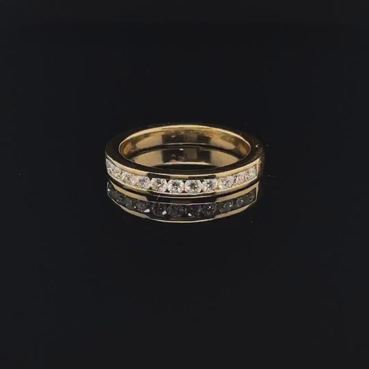 Round Diamond Channel Set in 18k Yellow Gold Band