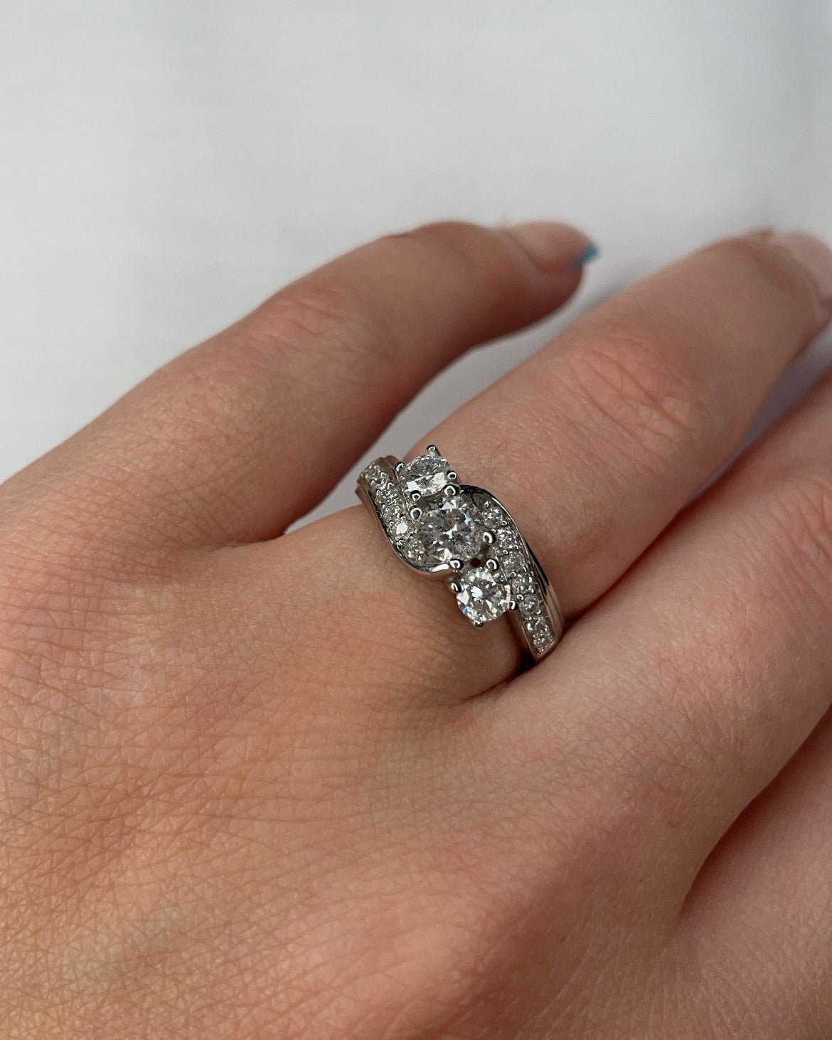 Three Diamond Engagement ring with Diamond twist