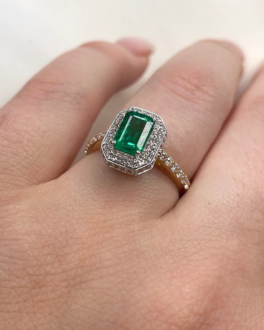18ct Emerald Cut emerald with diamond Halo Ring